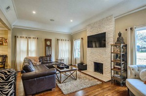 One of two living areas at 5514 Monticello Avenue, this one featuring a beautiful stone fireplace.