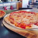 Kenny's East Coast Pizza will give free pizza to every table March 6