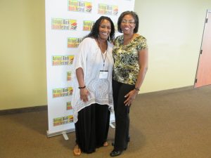 Cortina Jackson standing with another author