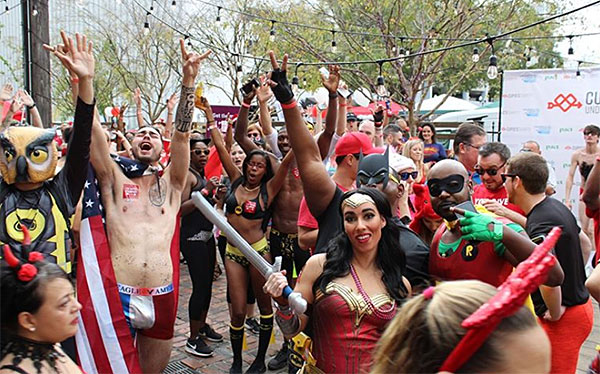 Cupid's Fun Run Party with people in costumes and undies for charity.